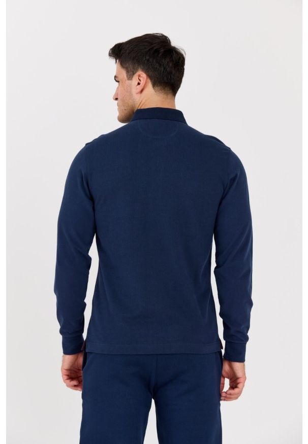 La Martina - LA MARTINA Granatowy męski longsleeve polo HEAVY JERSEY. Okazja: na co dzień. Typ kołnierza: polo. Kolor: niebieski. Materiał: jersey. Długość rękawa: długi rękaw. Styl: klasyczny, casual