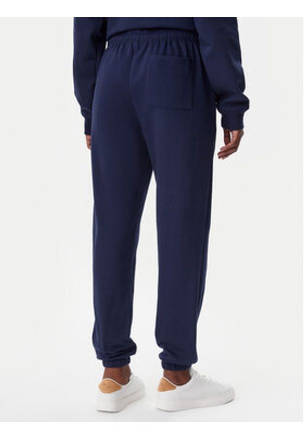 GAP - Gap Spodnie dresowe 500382-49 Granatowy Regular Fit. Kolor: niebieski. Materiał: bawełna