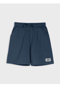 Sinsay - Bawełniane szorty loose z wafelkowej dzianiny - granatowy. Kolor: niebieski. Materiał: dzianina, bawełna #1