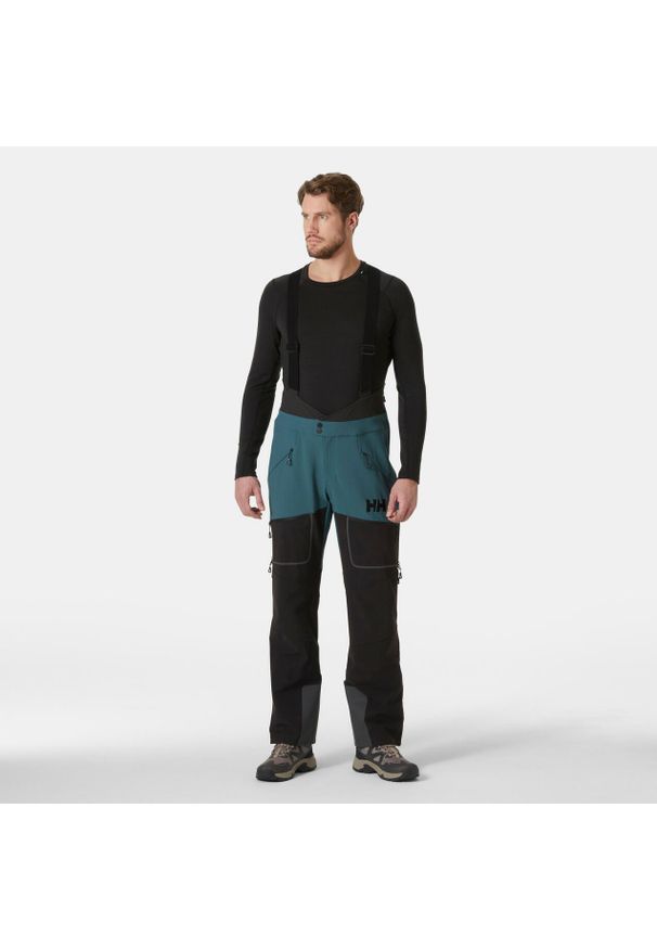 Spodnie narciarskie z szelkami Helly Hansen Odin BC Softshell. Kolor: zielony. Materiał: softshell. Sezon: zima. Sport: narciarstwo