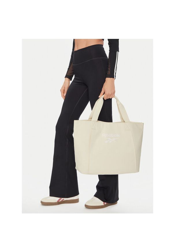 Torba sportowa Reebok. Kolor: kremowy. Styl: sportowy