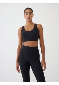 4f - 4F Biustonosz treningowy ze średnim wsparciem - czarny XS. Kolor: czarny. Materiał: guma, elastan, materiał, włókno, dzianina, syntetyk. Wzór: jednolity, gładki, ze splotem. Sport: kolarstwo, bieganie, fitness #1
