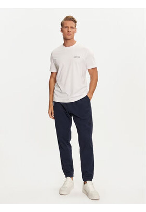 Adidas - adidas Spodnie dresowe Trefoil Essentials IY2305 Granatowy Regular Fit. Kolor: niebieski. Materiał: bawełna