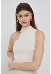 DKNY - Dkny top damski kolor beżowy z półgolfem. Typ kołnierza: dekolt halter. Kolor: beżowy. Materiał: dzianina #1