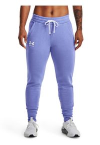 Under Armour Spodnie dresowe Rival Fleece Joggers 1356416 Fioletowy Regular Fit. Kolor: fioletowy. Materiał: dresówka