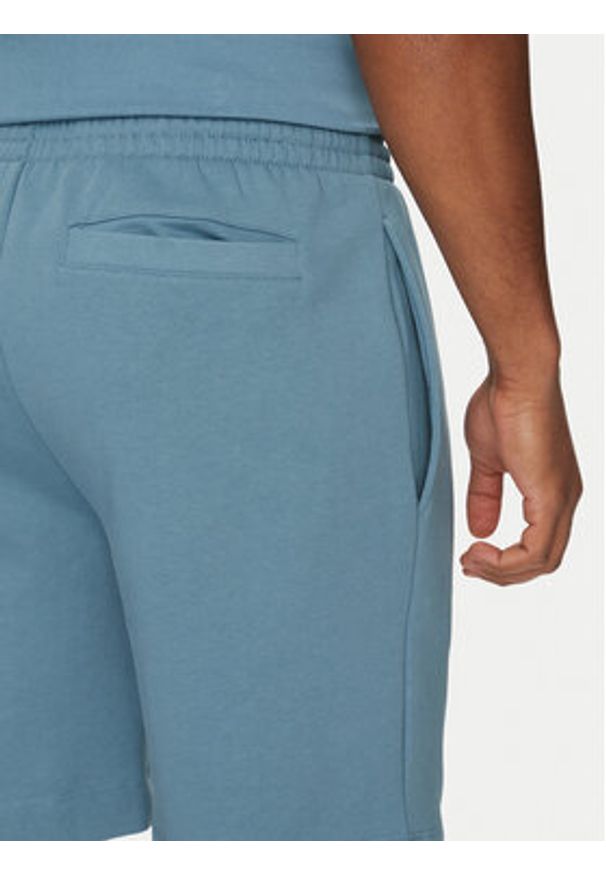 Lacoste Szorty sportowe GH9627 Niebieski Regular Fit. Kolor: niebieski. Materiał: bawełna. Styl: sportowy