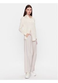 Calvin Klein Spodnie materiałowe K20K205861 Beżowy Relaxed Fit. Kolor: beżowy. Materiał: syntetyk #2
