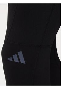 Adidas - adidas Legginsy Own The Run Winterized JN9597 Czarny Slim Fit. Kolor: czarny. Materiał: syntetyk. Sport: bieganie #5