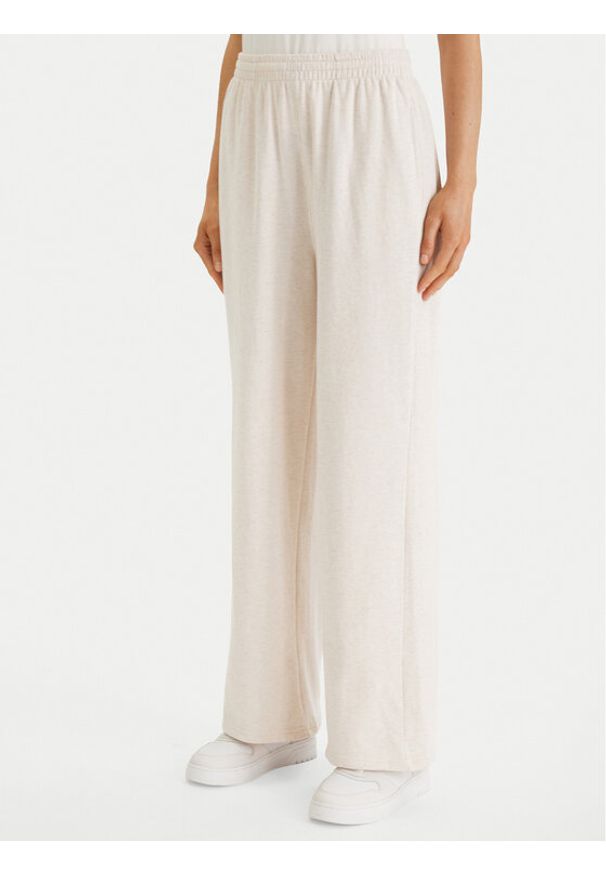 TOMMY HILFIGER - Tommy Hilfiger Spodnie dresowe UW0UW06180 Beżowy Wide Leg. Kolor: beżowy. Materiał: bawełna