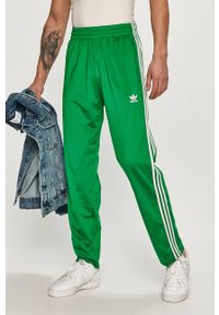 adidas Originals - Spodnie. Kolor: zielony. Materiał: dzianina. Wzór: aplikacja #1
