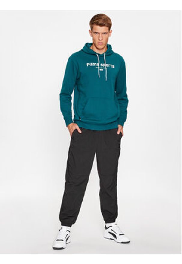 Puma Spodnie dresowe Classics Utility 622668 Czarny Regular Fit. Kolor: czarny. Materiał: syntetyk