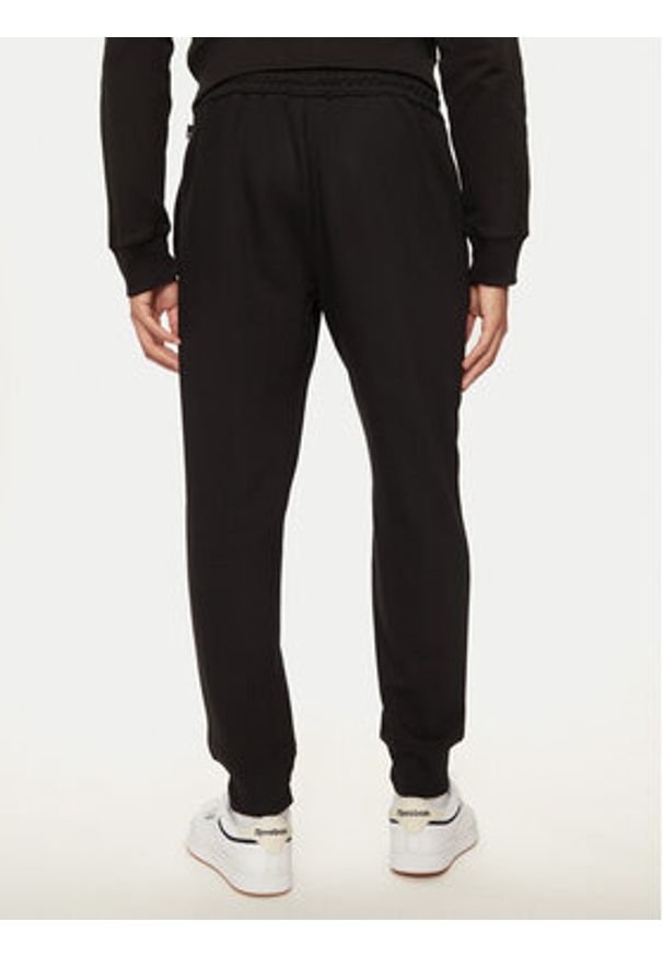 Timberland Spodnie dresowe TB0A5YFB0011 Czarny Regular Fit. Kolor: czarny. Materiał: bawełna