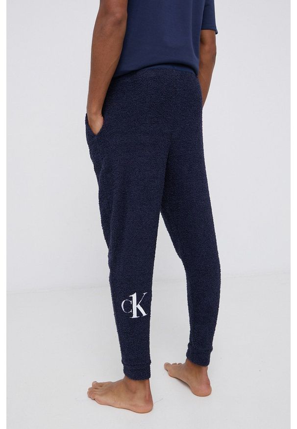 Calvin Klein Underwear Spodnie piżamowe męskie kolor granatowy wzorzyste. Kolor: niebieski. Materiał: materiał. Wzór: aplikacja