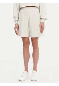 Calvin Klein Jeans Szorty sportowe J20J225221 Beżowy Relaxed Fit. Kolor: beżowy. Materiał: bawełna #1