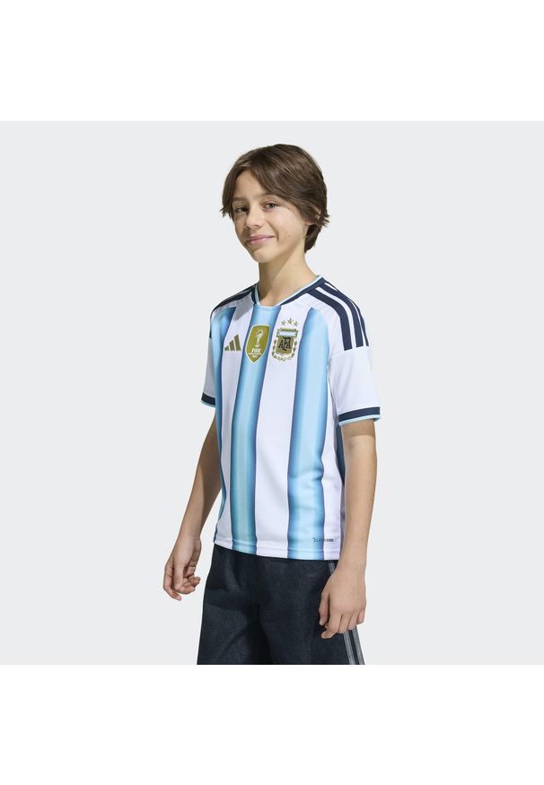 Adidas - Koszulka Argentina 26 Home Messi Kids. Kolor: wielokolorowy, niebieski, biały. Sport: piłka nożna