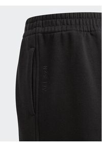 Adidas - adidas Spodnie dresowe Fleece Kids IL4937 Czarny Loose Fit. Kolor: czarny. Materiał: bawełna #3
