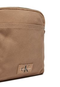 Calvin Klein Jeans Saszetka Sport Essentials K50K512571 Beżowy. Kolor: beżowy. Materiał: materiał