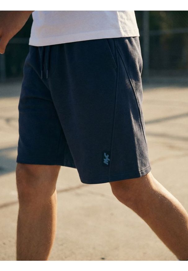 Sinsay - Szorty dresowe - granatowy. Kolor: niebieski. Materiał: dresówka