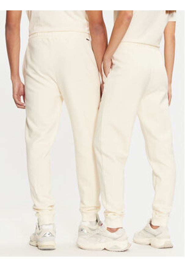 Fila Spodnie dresowe Unisex Bovrup FAU0146 Écru Regular Fit. Materiał: bawełna