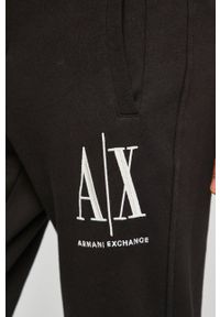 Armani Exchange Spodnie męskie kolor czarny gładkie. Kolor: czarny. Materiał: dzianina. Wzór: gładki