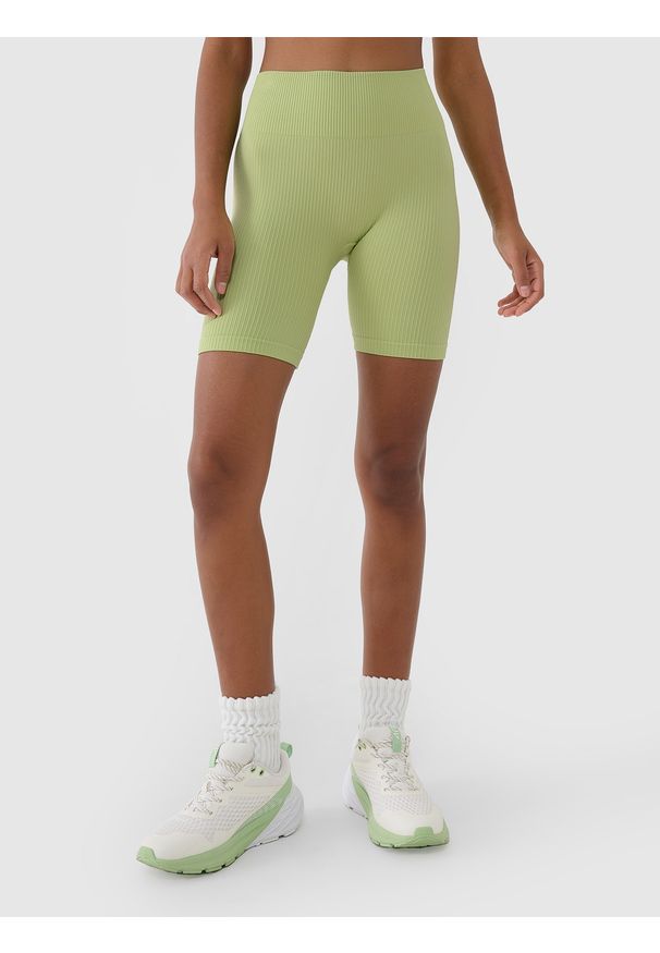4f - 4F Legginsy kolarki bezszwowe treningowe damskie - zielone XS/S. Stan: podwyższony. Kolor: zielony. Materiał: elastan, włókno, dzianina, materiał, syntetyk. Długość: krótkie. Wzór: jednolity. Sport: fitness