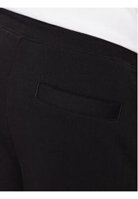 Hugo Spodnie dresowe 50447963 Czarny Regular Fit. Kolor: czarny. Materiał: dresówka