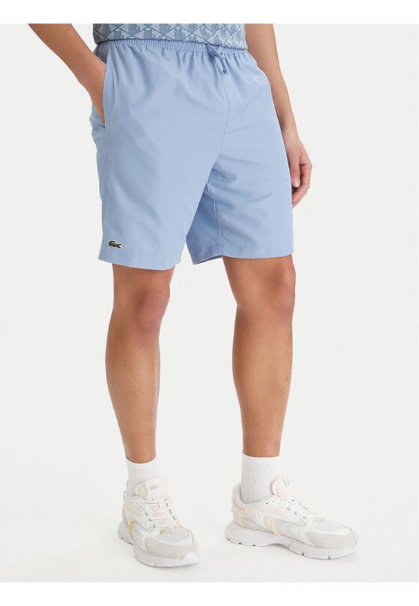 Lacoste Szorty sportowe GH353T Błękitny Relaxed Fit. Kolor: niebieski. Materiał: syntetyk. Styl: sportowy
