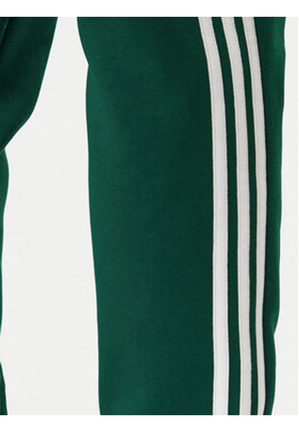 Adidas - adidas Spodnie dresowe 3-Stripes KE3559 Zielony Slim Fit. Kolor: zielony. Materiał: syntetyk, bawełna