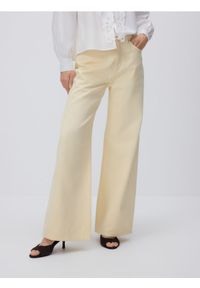 Reserved - Jeansy wide leg - żółty. Kolor: żółty #1
