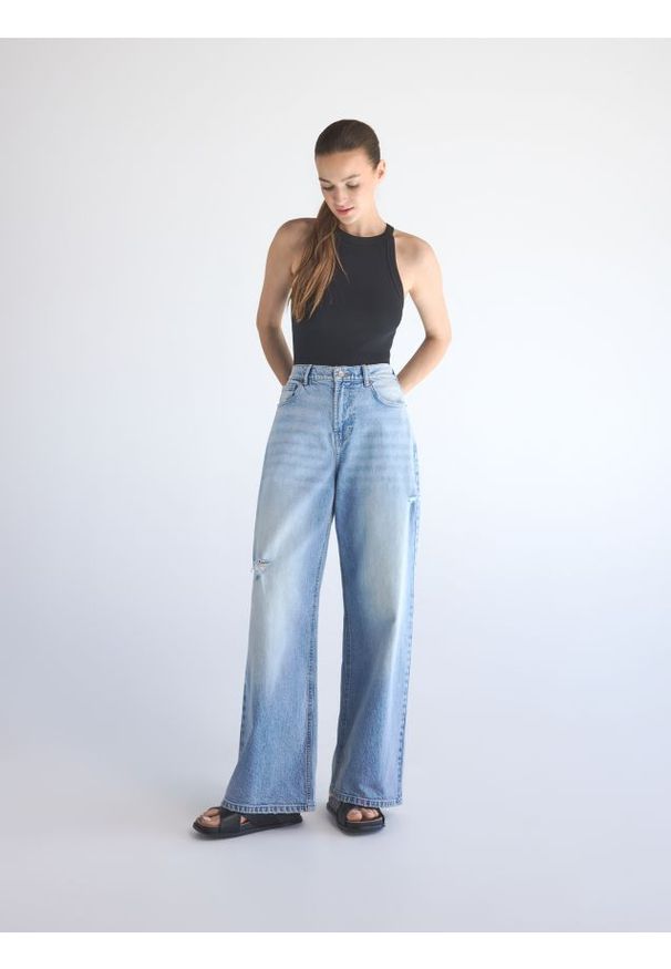 Reserved - Jeansy wide leg z przetarciami - niebieski. Kolor: niebieski