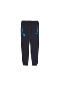 Puma - Spodnie dresowe OM Woven 2025/26. Kolor: niebieski. Materiał: dresówka. Sport: piłka nożna