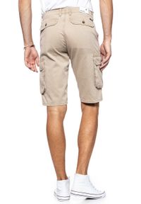 Wrangler - SPODENKI MĘSKIE WRANGLER CARGO SHORT CORNSTALK W15DKC335 112126788. Materiał: bawełna