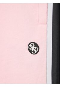 Guess Spodnie dresowe J3YQ13 KA6R3 Różowy Relaxed Fit. Kolor: różowy. Materiał: bawełna