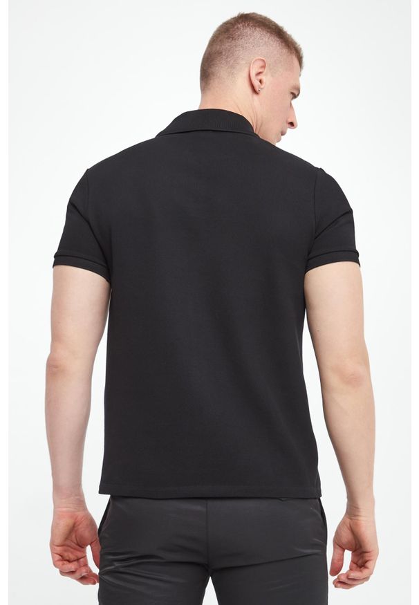 Balmain - Polo męskie BALMAIN. Typ kołnierza: polo