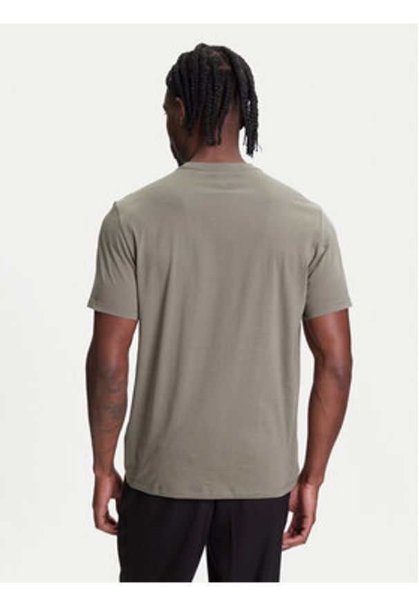 Calvin Klein T-Shirt Box Tape Graphic LV04RC854G Zielony Regular Fit. Kolor: zielony. Materiał: bawełna