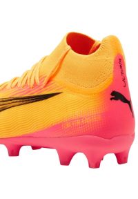 Buty piłkarskie Puma Ultra Pro FG/AG Jr 107769 03 pomarańczowe. Kolor: pomarańczowy. Materiał: syntetyk. Szerokość cholewki: normalna. Sport: piłka nożna