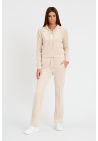 Juicy Couture - JUICY COUTURE Beżowe spodnie Tina Track Pants. Kolor: beżowy. Materiał: dresówka