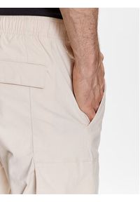 Calvin Klein Jeans Spodnie materiałowe J30J322922 Beżowy Skinny Fit. Kolor: beżowy. Materiał: bawełna, syntetyk #5
