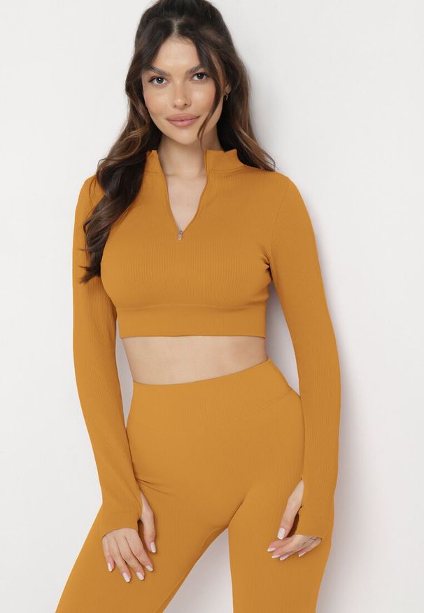 Born2be - Żółta Bluzka Zapinana na Suwak z Wycięciem przy Ściągaczu Aisllain. Kolor: żółty. Styl: elegancki