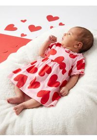 Sinsay - Sukienka dresowa ze wzorem w serca - różowy. Kolor: różowy. Materiał: dresówka #1