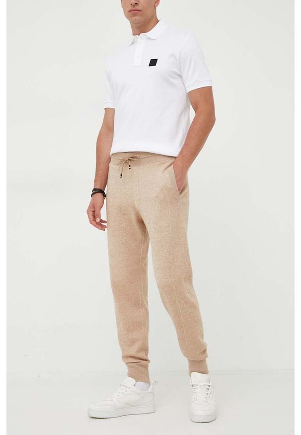 BOSS spodnie dresowe z domieszką wełny kolor beżowy melanżowe. Kolor: beżowy. Materiał: wełna, dresówka. Wzór: melanż