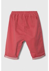 United Colors of Benetton spodnie niemowlęce kolor różowy gładkie. Okazja: na co dzień. Kolor: różowy. Materiał: materiał. Wzór: gładki. Styl: casual #2