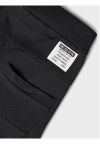 Name it - NAME IT Spodnie dresowe 13147424 Czarny Regular Fit. Kolor: czarny. Materiał: bawełna
