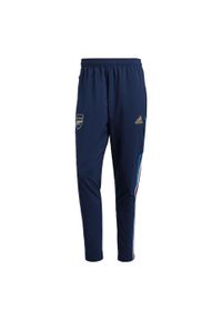 Spodnie do piłki nożnej męskie Adidas Arsenal Presentation Pants. Kolor: niebieski. Materiał: dresówka, materiał