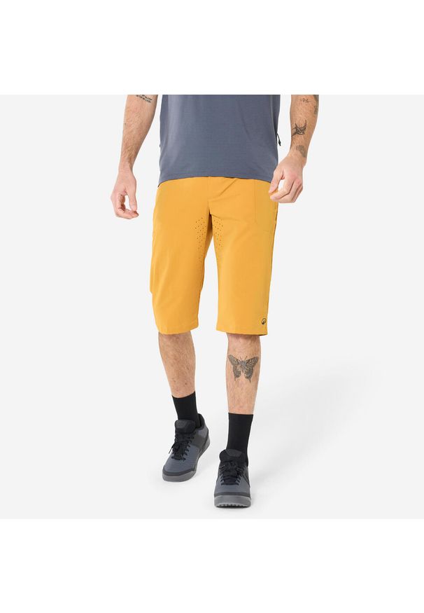 ROCKRIDER - Szorty rowerowe Rockrider unisex. Kolor: żółty, wielokolorowy, czarny, brązowy. Materiał: materiał, poliamid, poliester, elastan