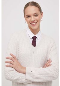 TOMMY HILFIGER - Tommy Hilfiger sweter wełniany damski kolor beżowy lekki. Kolor: beżowy. Materiał: wełna. Długość rękawa: długi rękaw. Długość: długie. Wzór: ze splotem #2