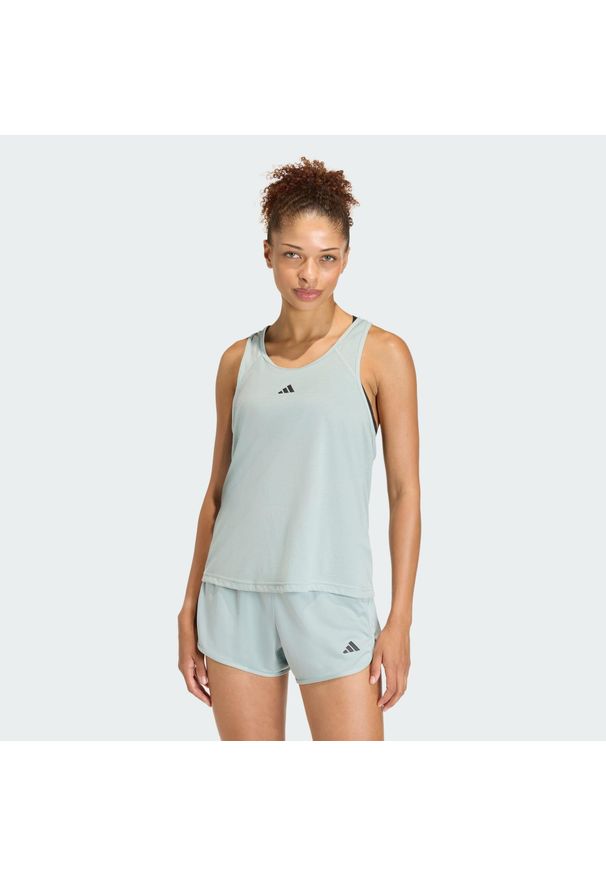 Adidas - Koszulka Train Essentials Minimal Branding Racerback Tank. Kolor: zielony. Materiał: materiał. Długość rękawa: bez rękawów. Wzór: gładki. Sport: fitness