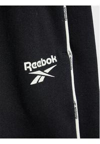 Reebok Spodnie dresowe Piping Pack HN4366 Czarny Regular Fit. Kolor: czarny. Materiał: bawełna