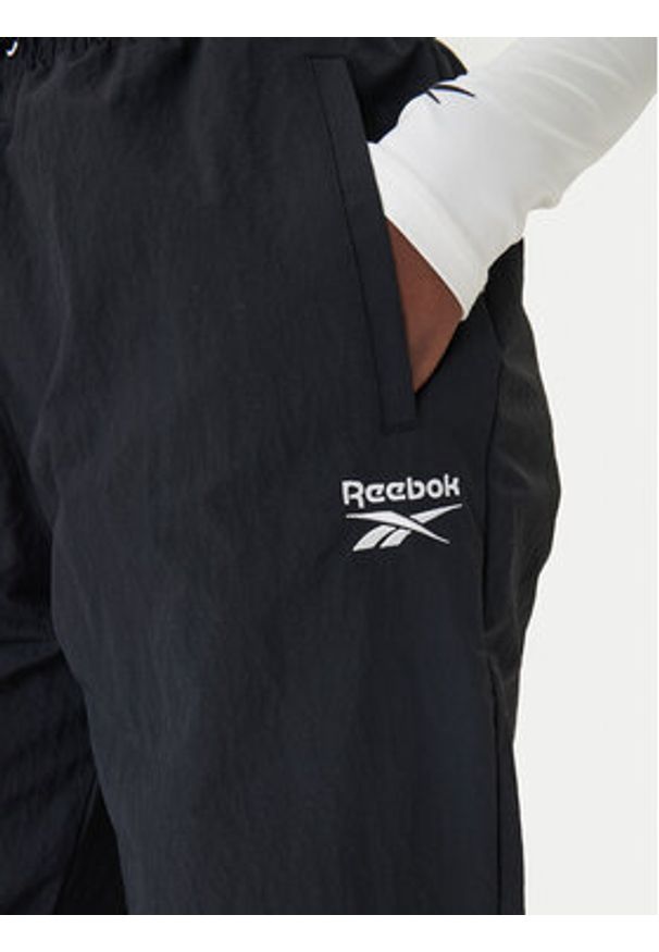 Reebok Spodnie dresowe Galina RK25518CCW Czarny Relaxed Fit. Kolor: czarny. Materiał: syntetyk