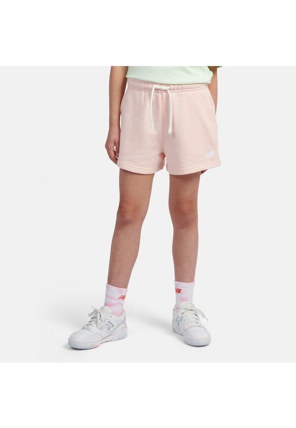 Spodenki dziecięce New Balance LAKG0006PIE – różowe. Kolor: różowy. Materiał: bawełna, poliester. Styl: sportowy